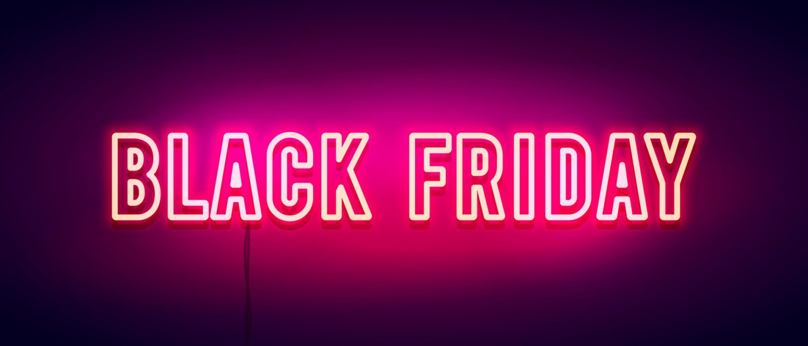 Black Friday: Eine pinke Neonschrift mit dem Schriftzug "Black Friday"
