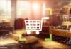 Visual Economy: Ein digitaler Einkaufswagen mit Diagrammen, vor einem Geschäft.